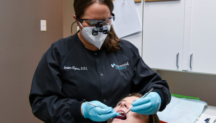 A dental procedure underway at a dental clinic.